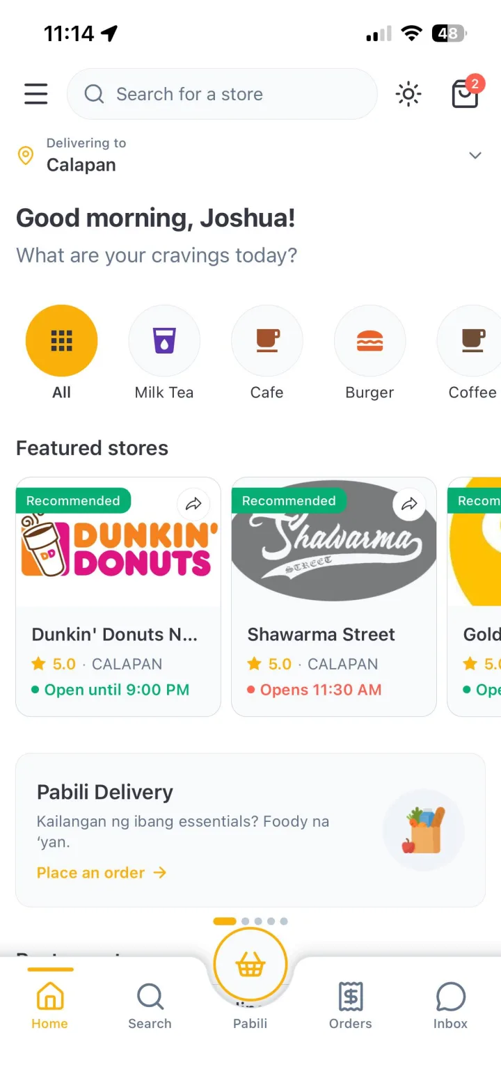 Browsing stores on Foody with the delivery address set to Calapan