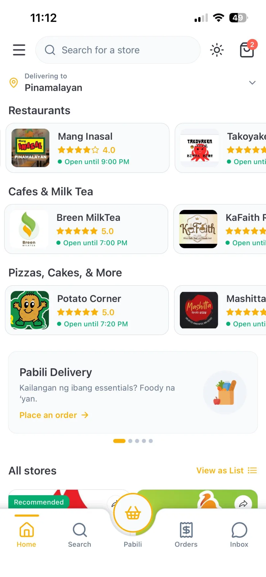 Browsing stores on Foody with the delivery address set to Pinamalayan