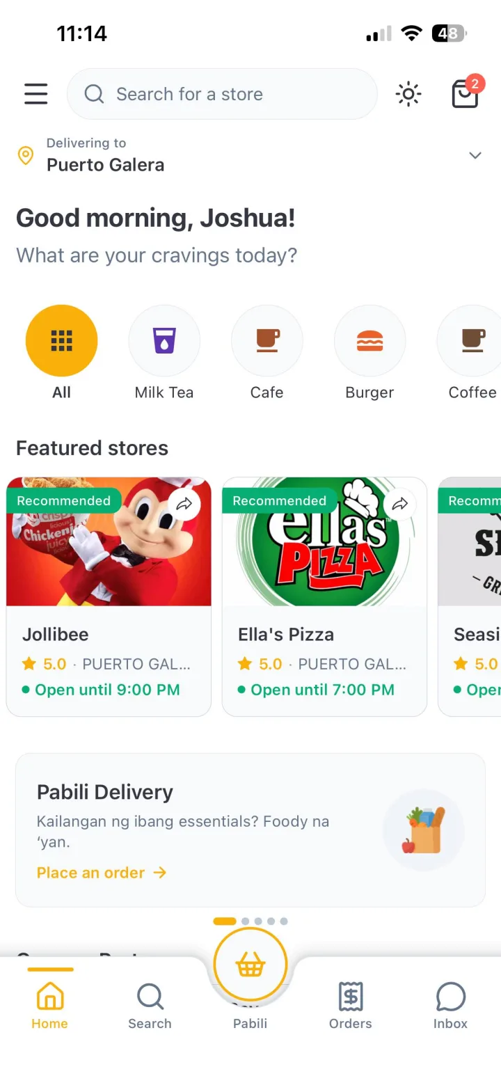 Browsing stores on Foody with the delivery address set to Puerto Galera