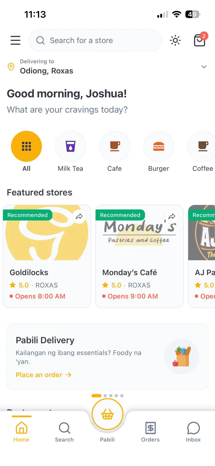 Browsing stores on Foody with the delivery address set to Roxas